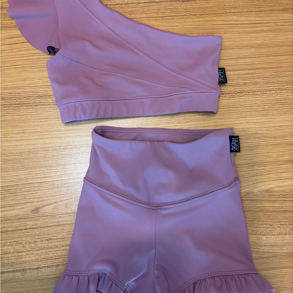 Tiger Friday Child Medium Plush One Shoulder Crop With Matching Ruffle Shorts.